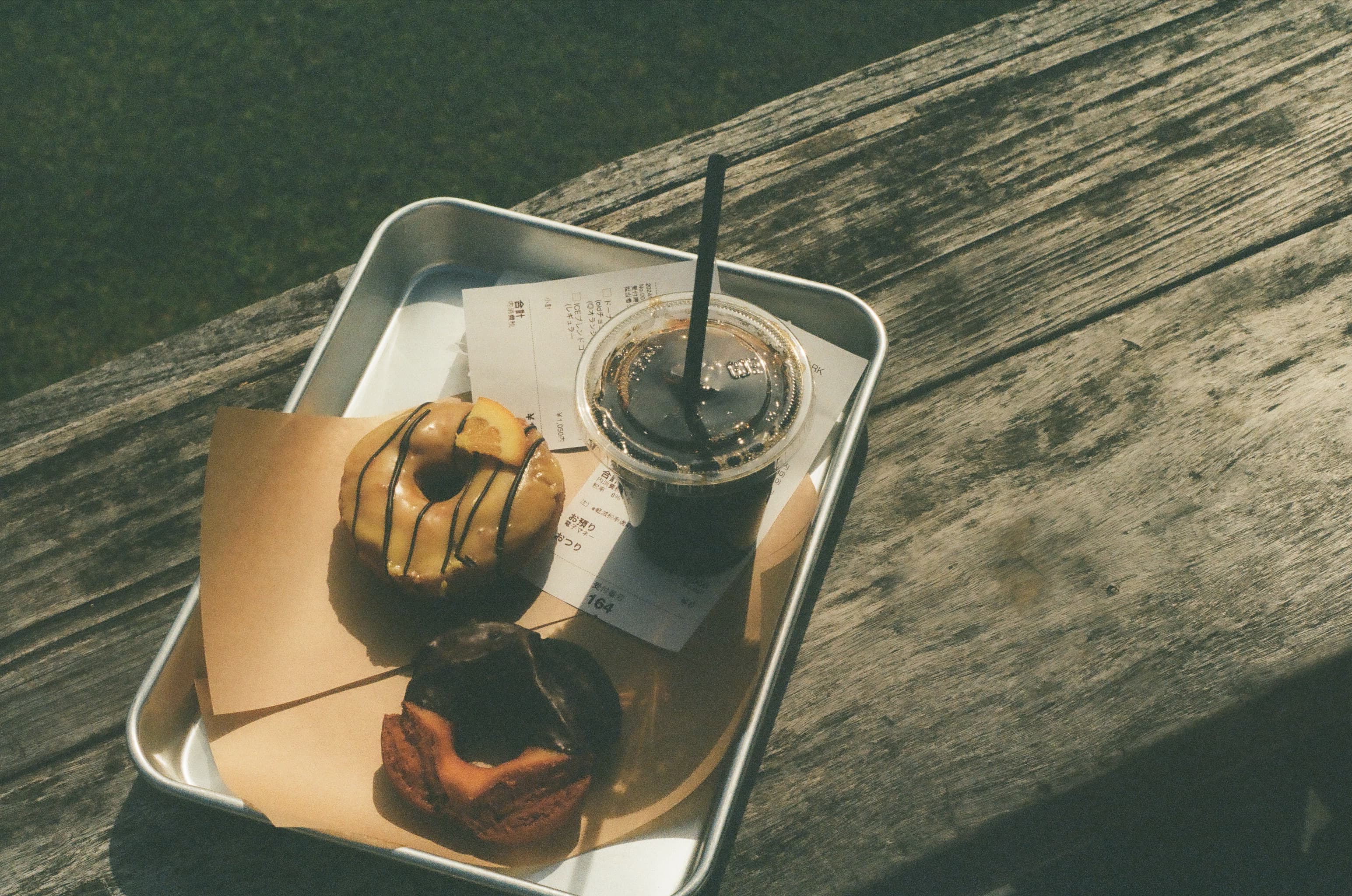 Coffee and donuts on a tray